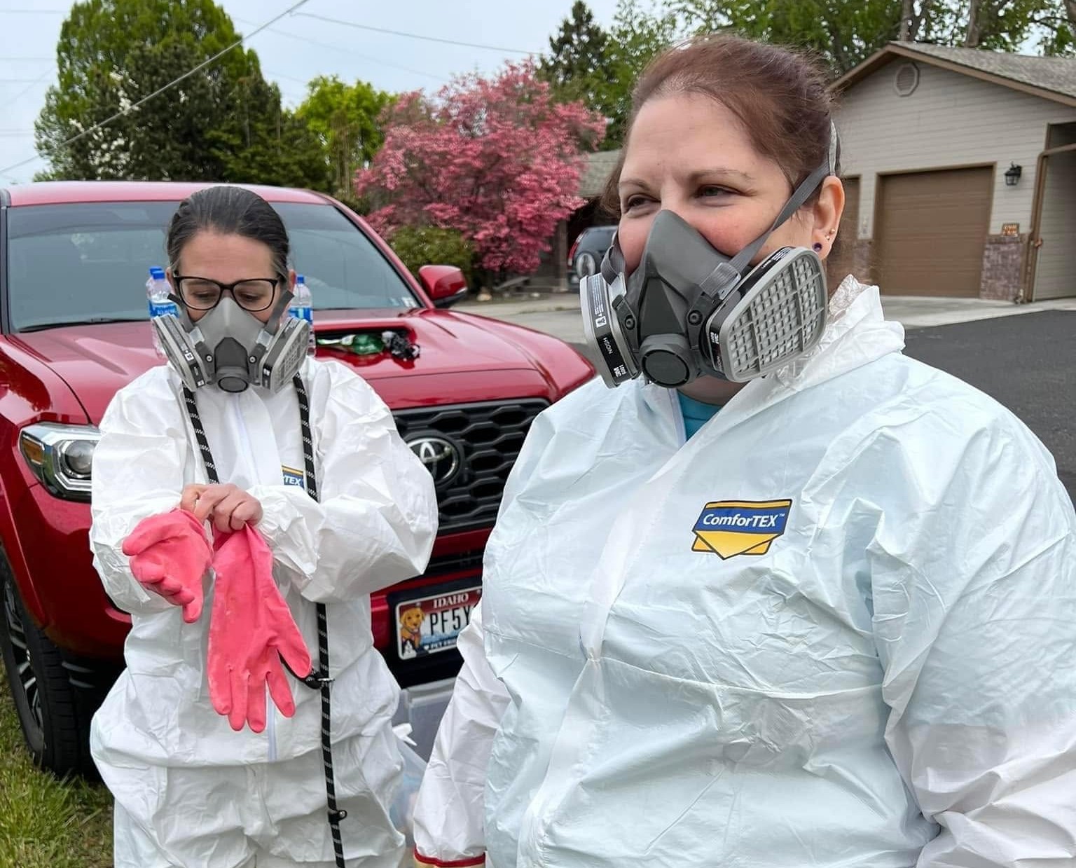 Volunteers in protective gear during field response