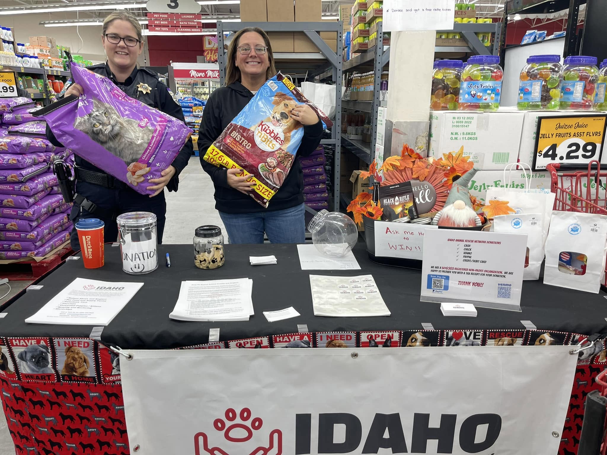 Volunteers staffing a community outreach table